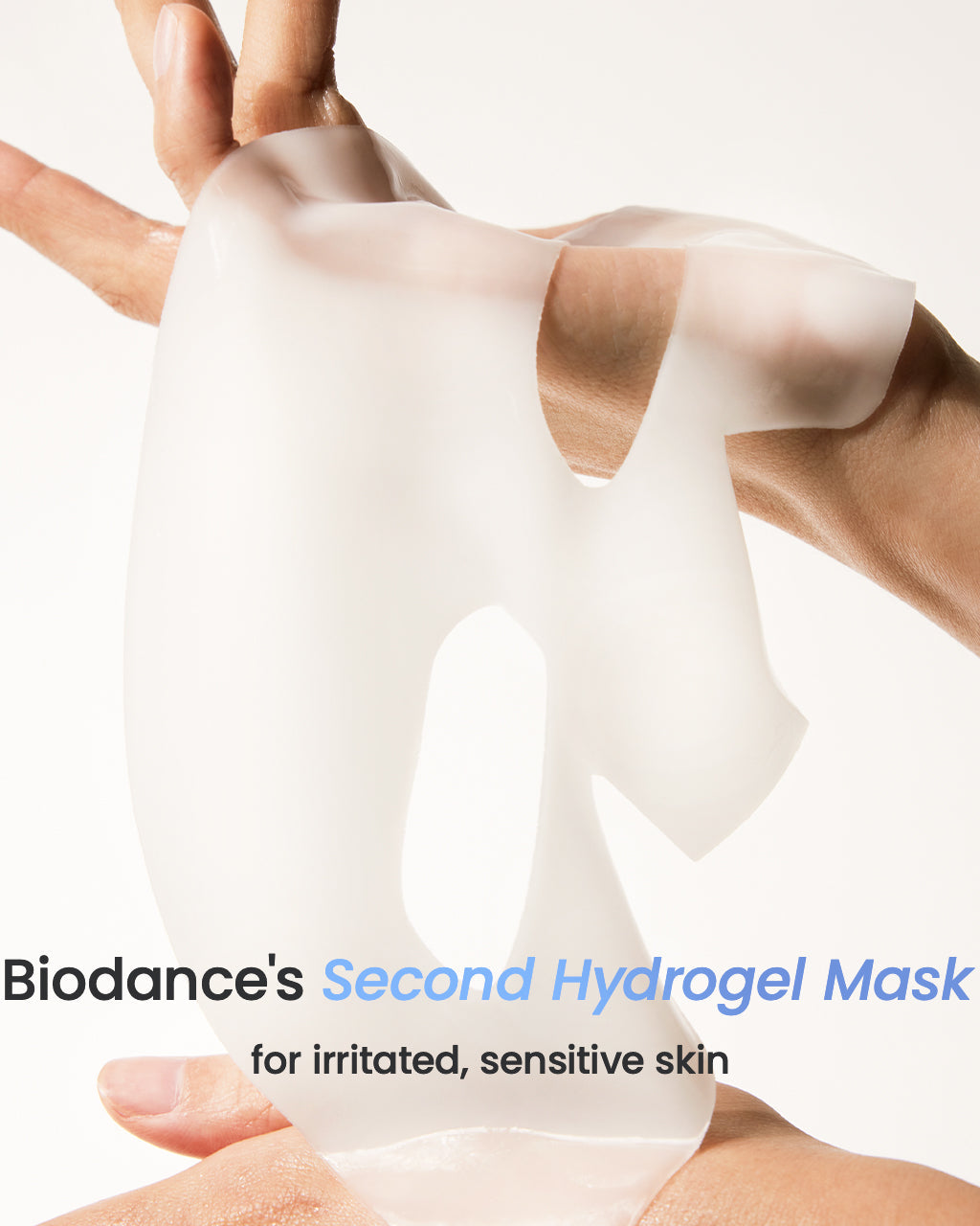 Biodance's Second Hydrogel Mask being held by a hand on a white background