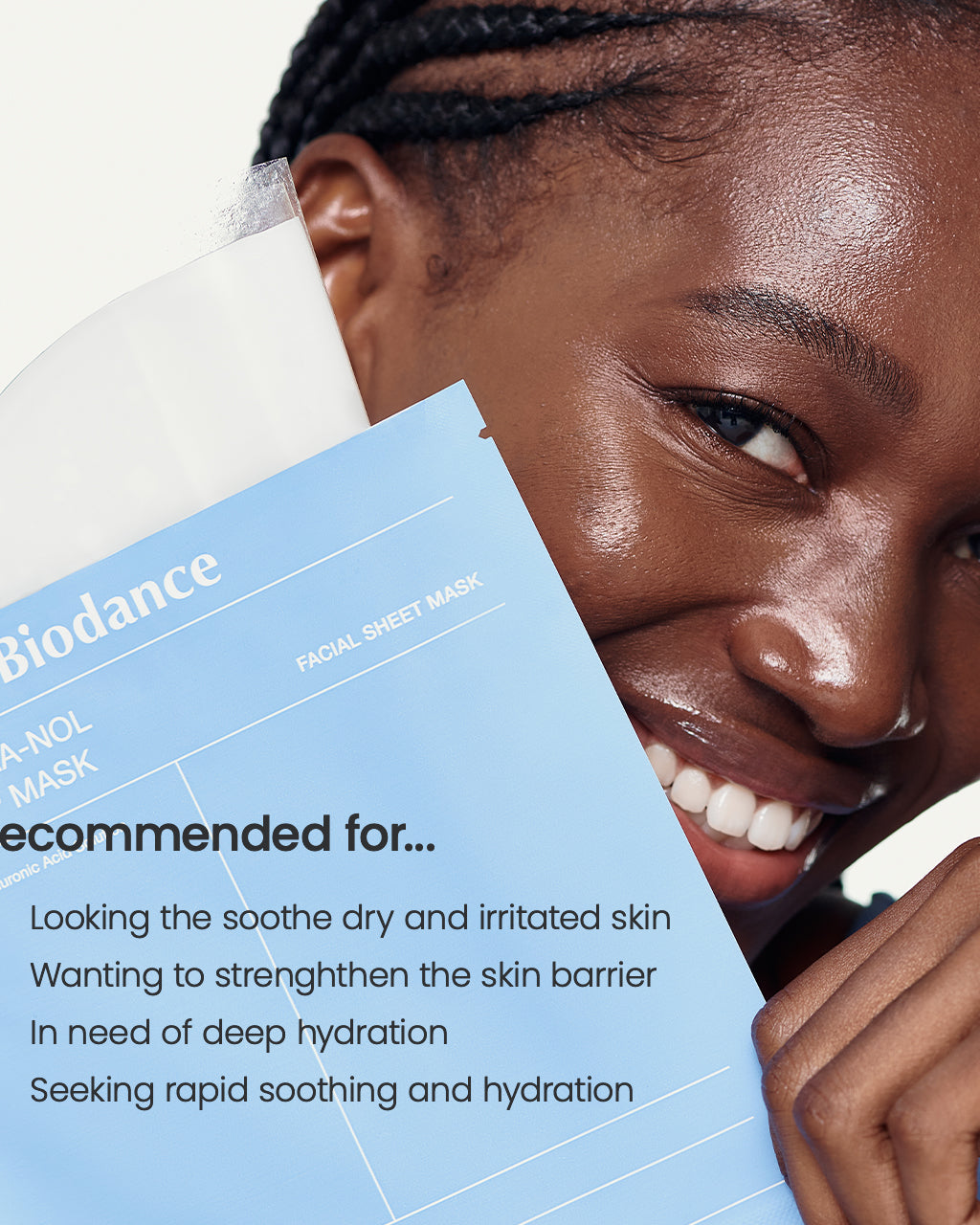 Woman holding a Biodance facial sheet mask with product details.